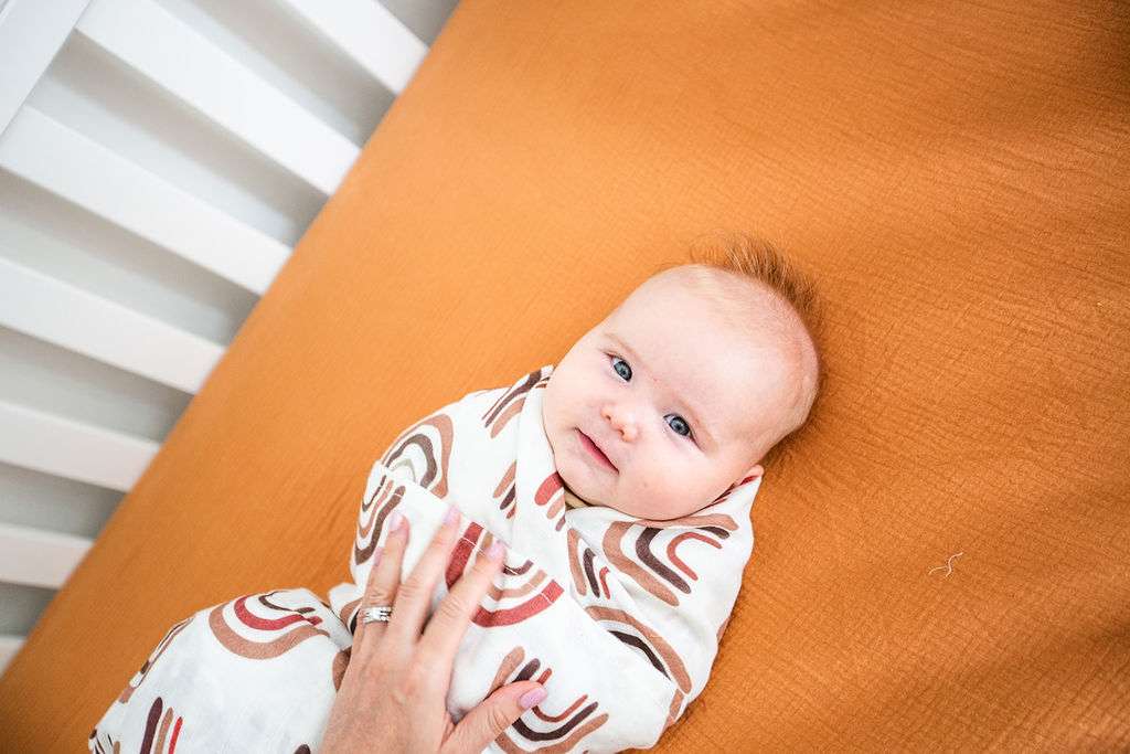 Load image into Gallery viewer, rainbow muslin baby swaddle neutral
