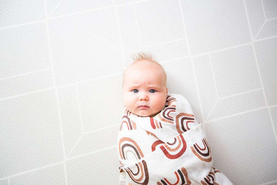 Load image into Gallery viewer, rainbow neutral earthy bamboo baby swaddle
