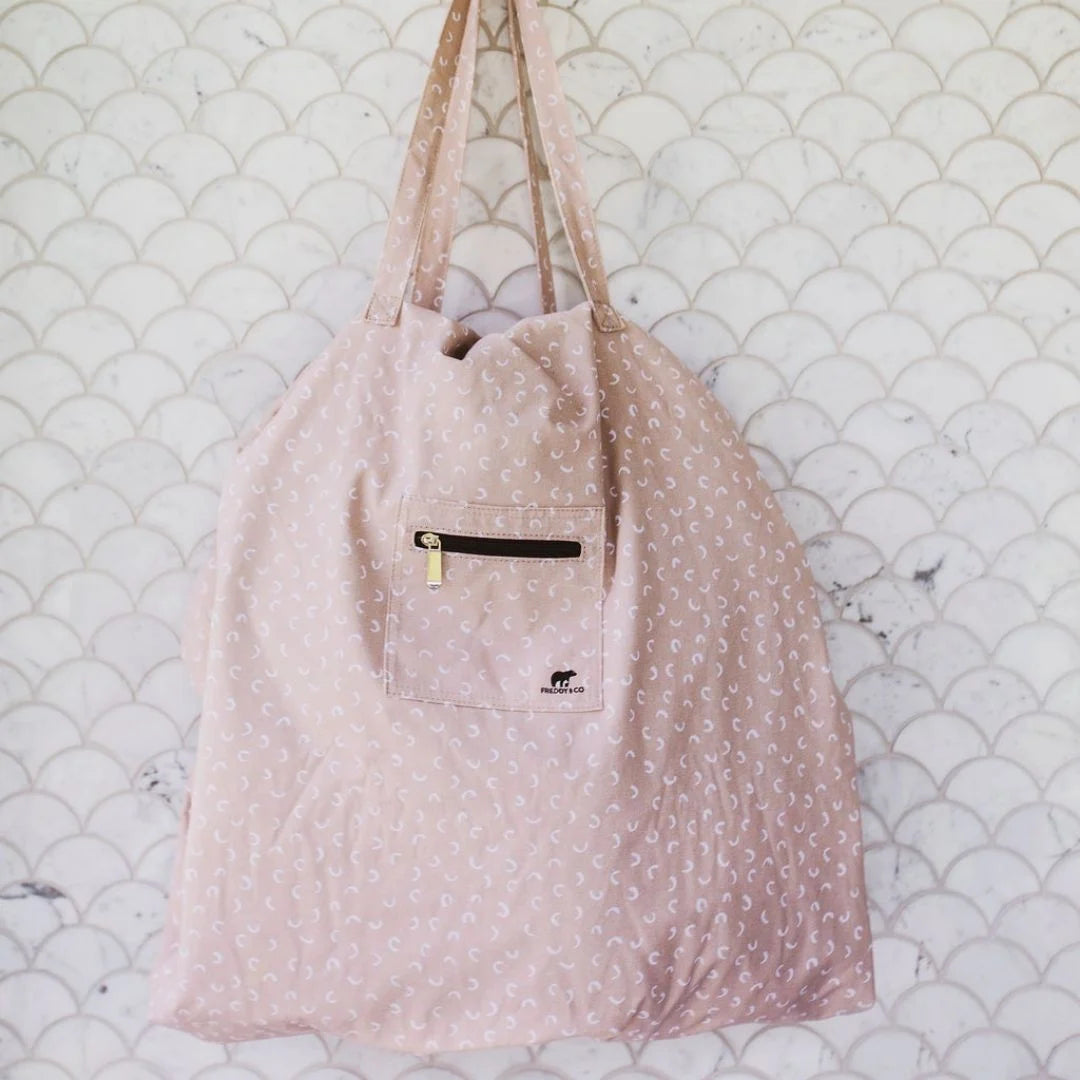 Play mat that turns into hotsell a bag